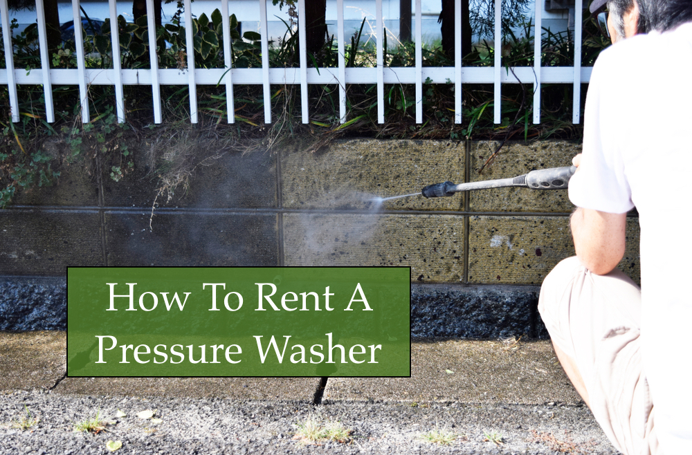 Image of a man using a pressure washer rental